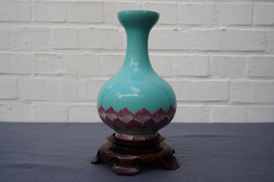 A Chinese famille rose turquoise ground lotus flower-shaped vase, 19/20th C.